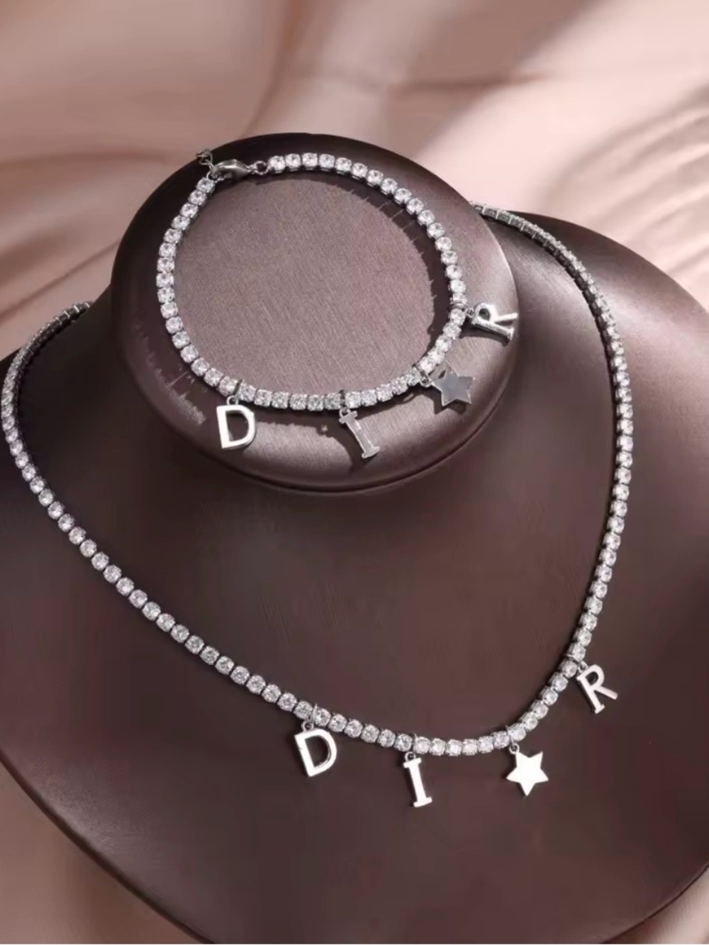 Silver Dior bracelet and necklace